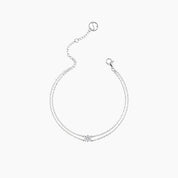 Round-cut moissanite double-chain bracelet in white gold vermeil, open view showing the closure.