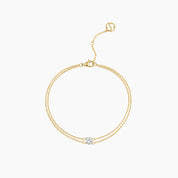 Round-cut moissanite double-chain bracelet in yellow gold vermeil, full product view.