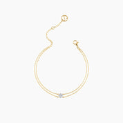 Round-cut moissanite double-chain bracelet in yellow gold vermeil, open view showing the closure.