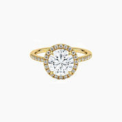 Round-cut moissanite halo ring with pavé band in yellow gold vermeil, front view.