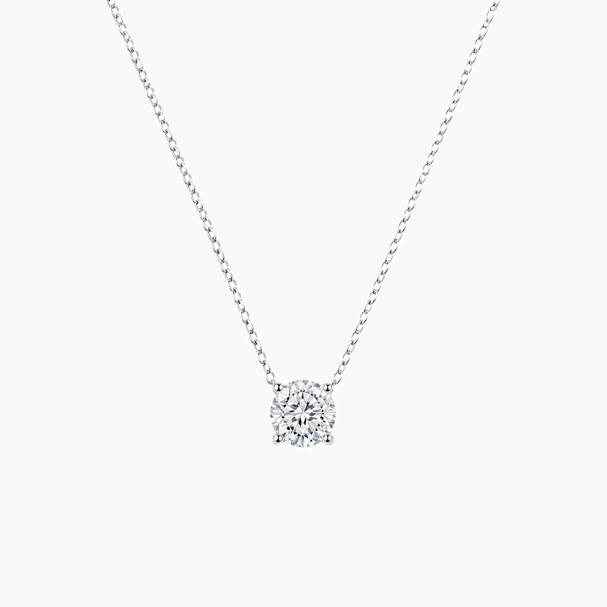 Round-cut moissanite pendant necklace in white gold vermeil, front view.