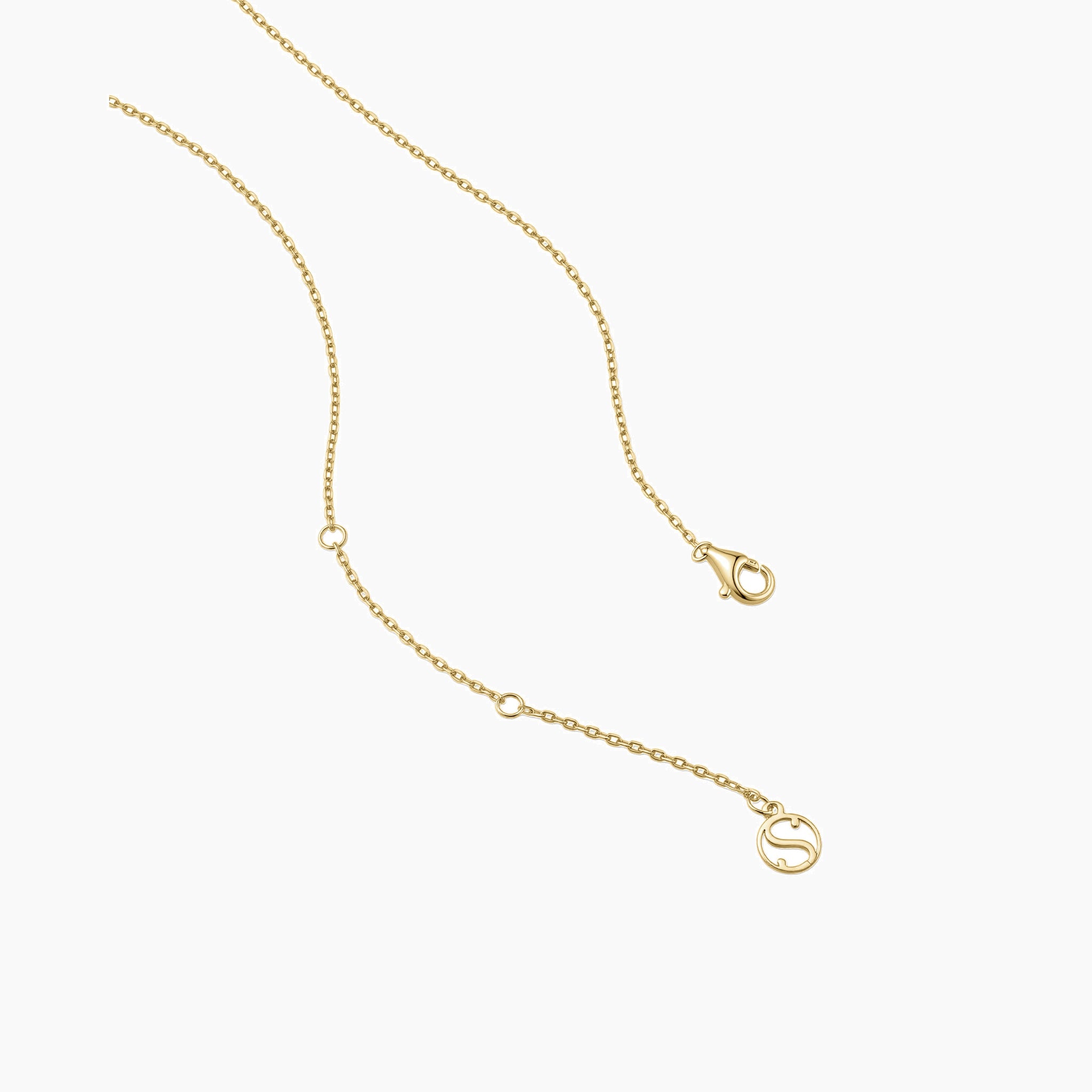 Round-cut moissanite pendant necklace in yellow gold vermeil, clasp and chain-end detail.