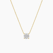 Round-cut moissanite pendant necklace in yellow gold vermeil, front view.