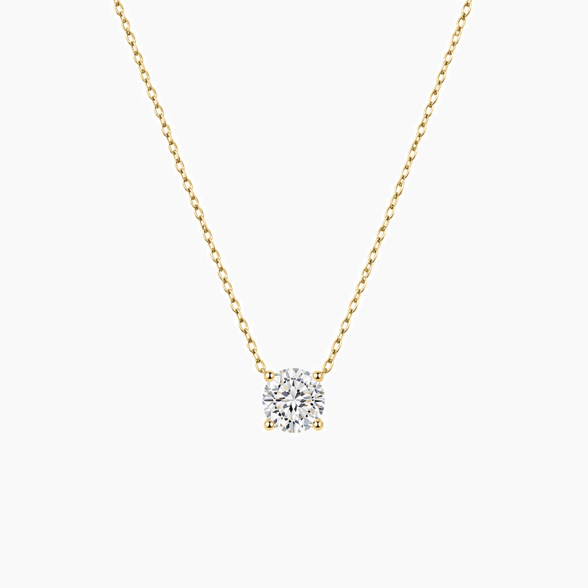 Round-cut moissanite pendant necklace in yellow gold vermeil, front view.