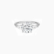 Round-cut moissanite three-stone ring in white gold vermeil, front view.