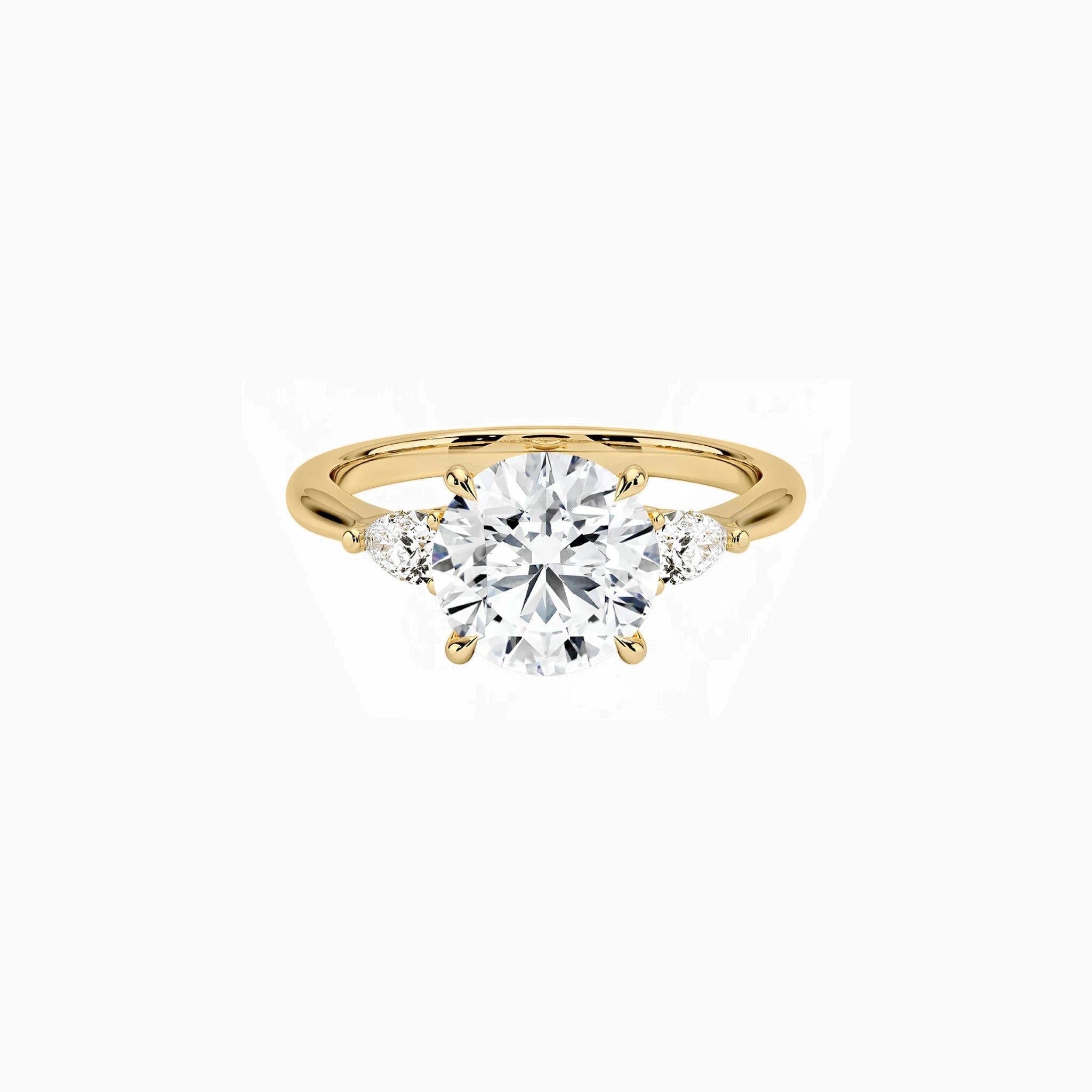 Round-cut moissanite three-stone ring in yellow gold vermeil, front view.