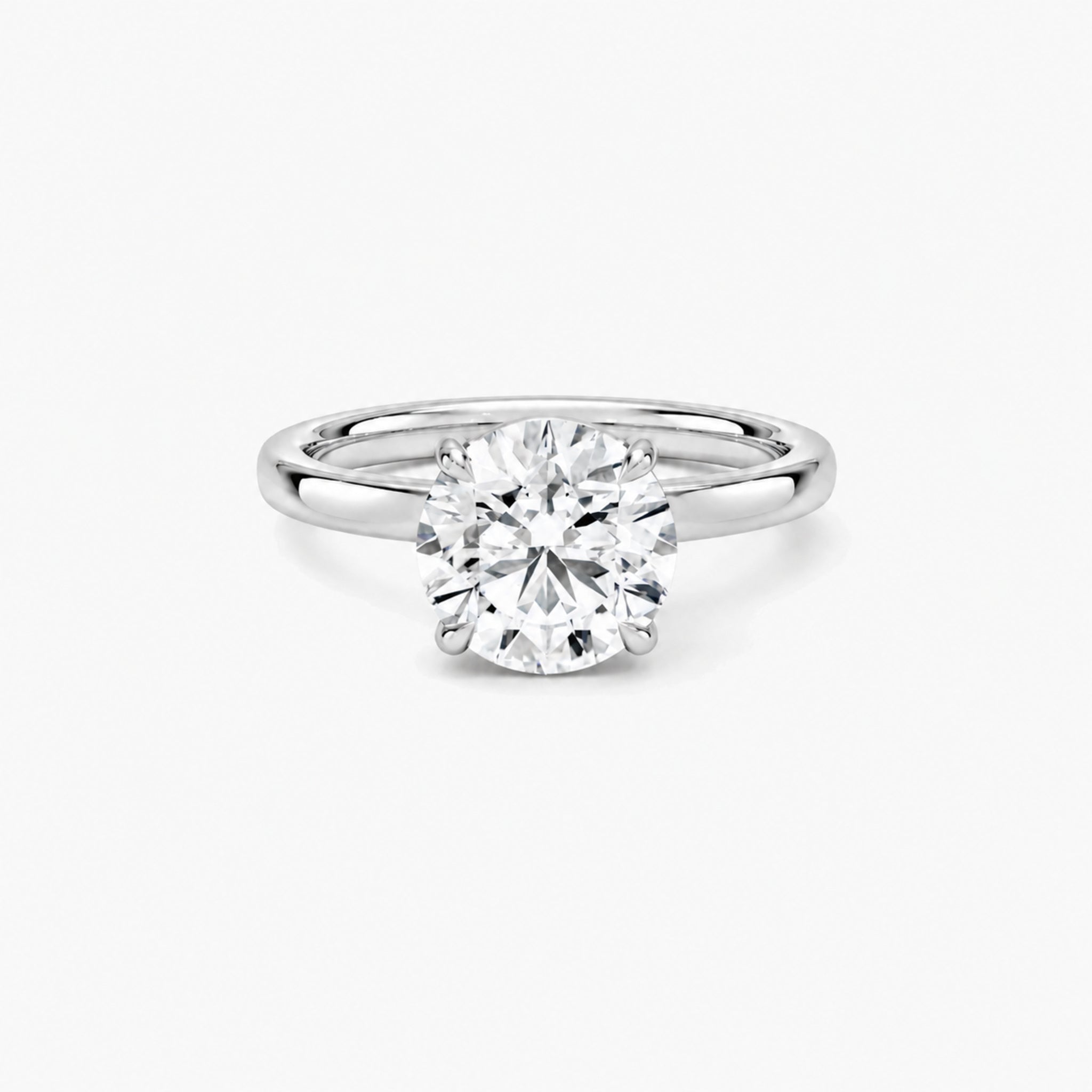 Round-cut moissanite solitaire ring in white gold vermeil, front view