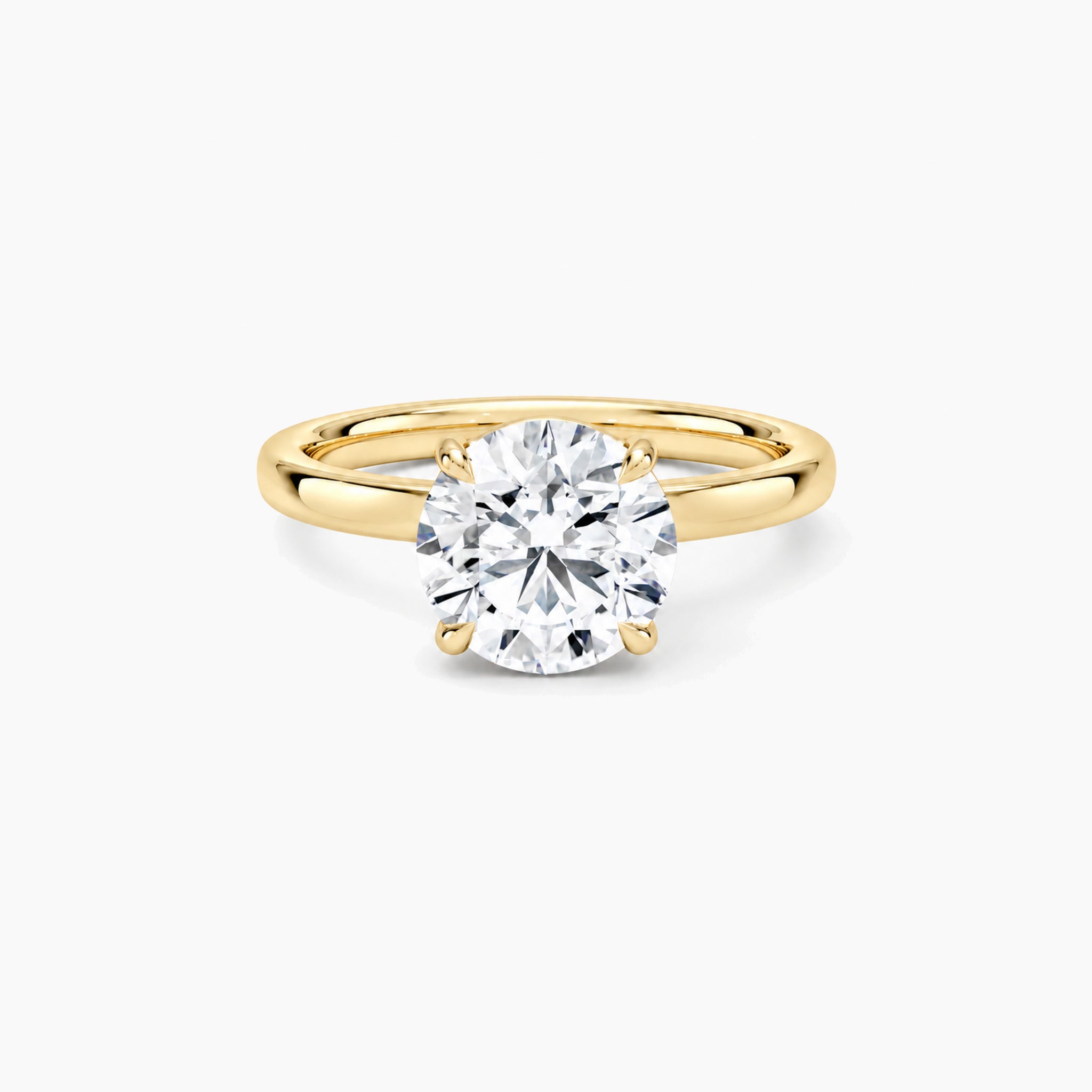 round-cut moissanite solitaire ring in yellow gold vermeil, front view