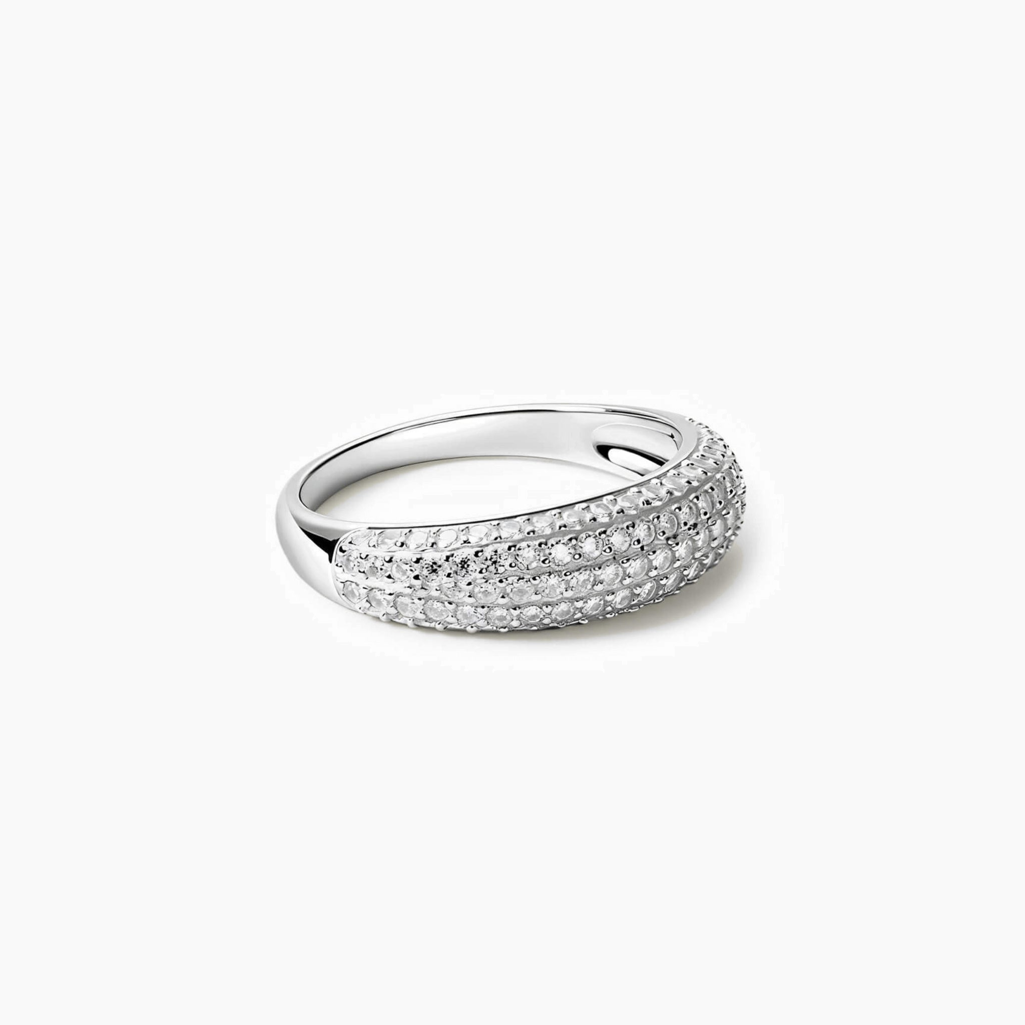 Slim pavé moissanite dome ring in white gold vermeil, angled view.