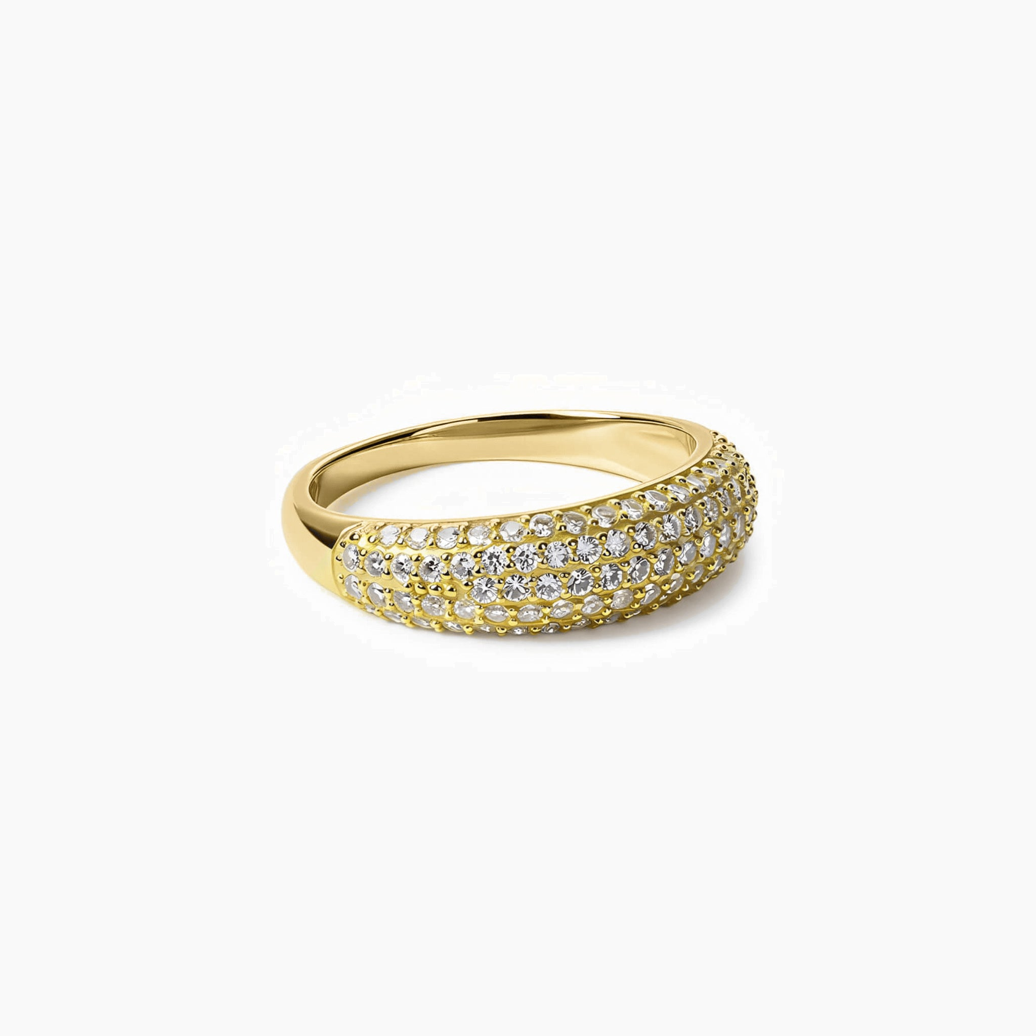 Slim pavé moissanite dome ring in yellow gold vermeil, angled view.