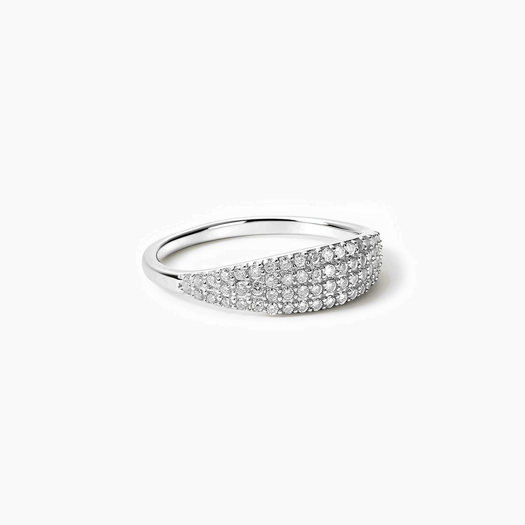 Slim pavé moissanite signet ring in white gold vermeil, angled view.