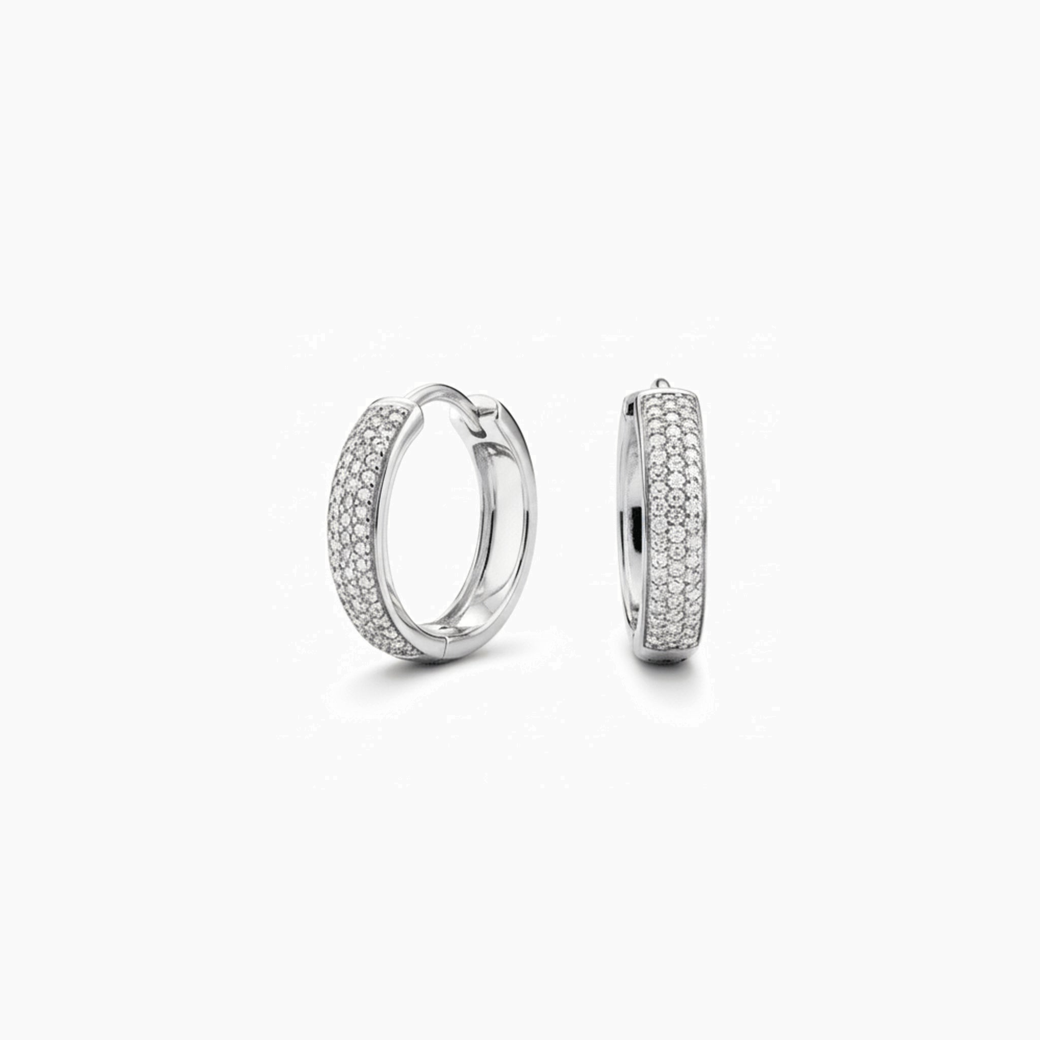 Small bold pavé moissanite hoop earrings in white gold vermeil, front and side views.