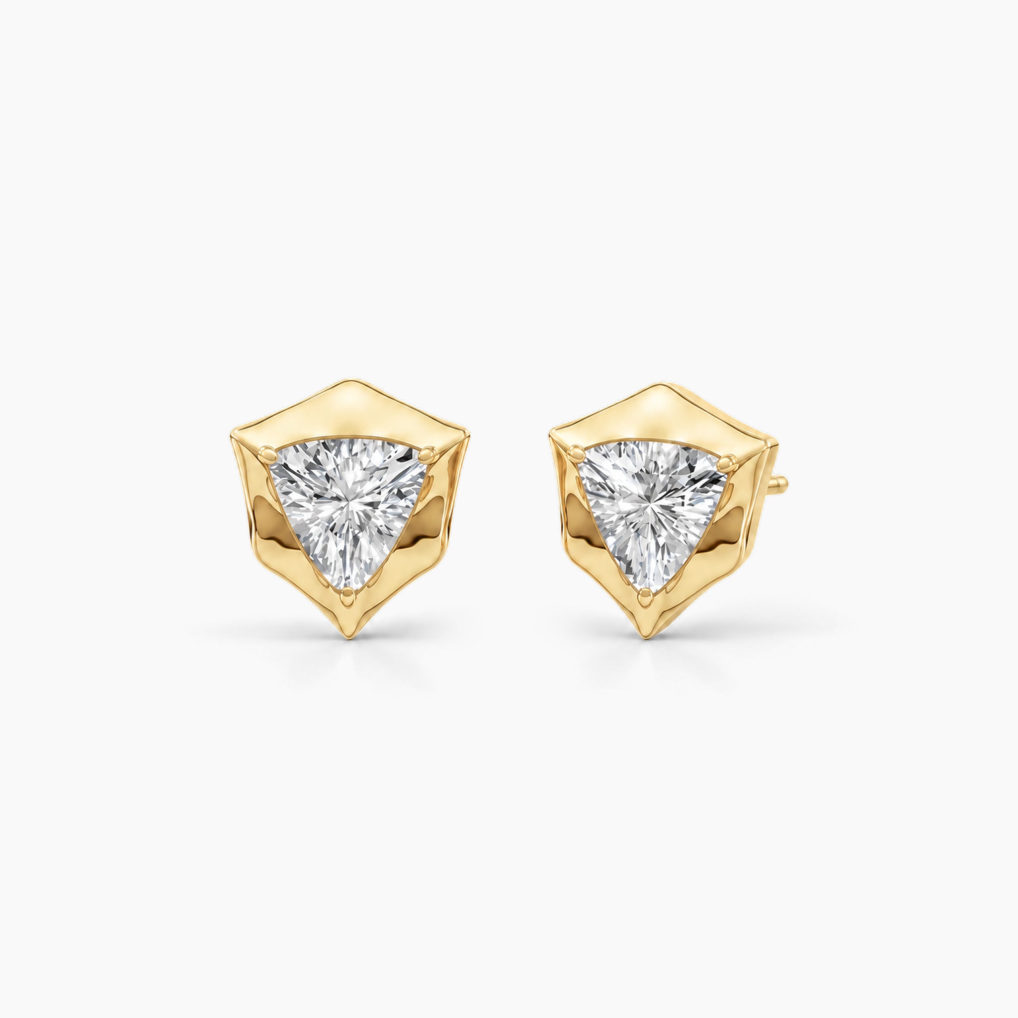 Trillion-cut moissanite bezel-prong stud earrings in 18k yellow gold vermeil, front and angled views.